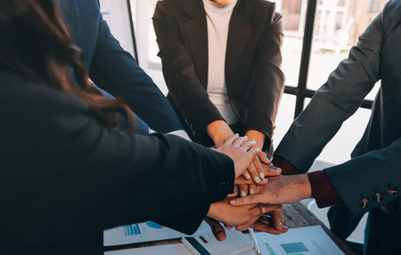 Business handshake for teamwork of business merger and acquisition, successful negotiate, hand shake, two businessman shake hand with partner to celebration partnership and business deal conceptの写真素材