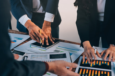 Accounting company provide finance and taxation planning for profitable cash flow, Auditor and accountant team working in office, analyze financial data and accounting record with calculator.Insightの写真素材