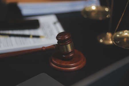 female business woman lawyers working at the law firms. Judge gavel with scales of justice. Legal...