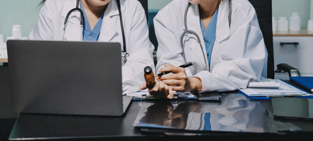 Team of professional doctors having meeting in office