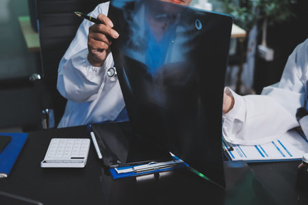 Team of professional doctors having meeting in officeの写真素材