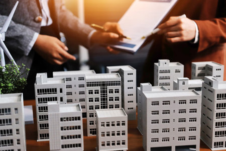 Discussion among businesspeople on the latest developments in solar cell panel technology and Solar Energy Environment city Concept.の写真素材