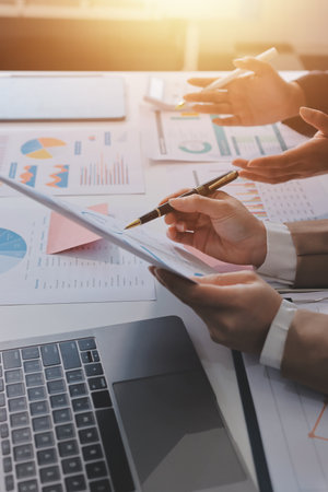 Accounting company provide finance and taxation planning for profitable cash flow, Auditor and accountant team working in office, analyze financial data and accounting record with calculator.Insightの写真素材