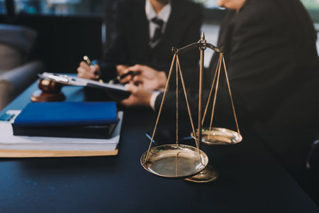 Judge gavel with Justice lawyers, Business woam in suit or lawyer working on a documents. Legal law, advice and justice concept.の写真素材