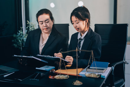 Judge gavel with Justice lawyers, Business woam in suit or lawyer working on a documents. Legal law,...
