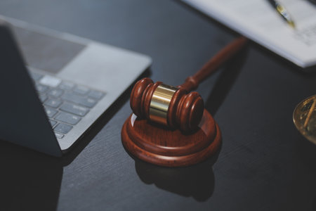female business woman lawyers working at the law firms. Judge gavel with scales of justice. Legal...
