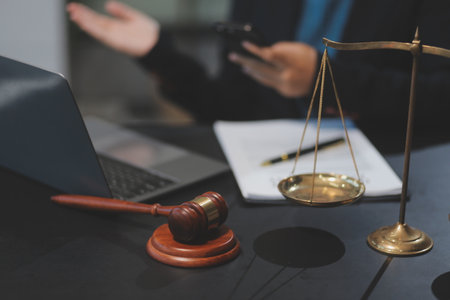 female business woman lawyers working at the law firms. Judge gavel with scales of justice. Legal...
