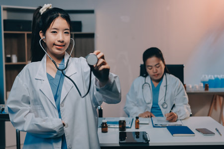 doctors and nurse having informal meeting in hospital canteenの写真素材