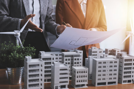 Discussion among businesspeople on the latest developments in solar cell panel technology and Solar Energy Environment city Concept.の写真素材