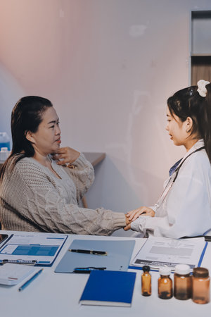 Medicine doctor reassuring her female patientの写真素材