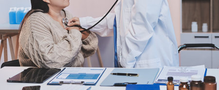 Doctor use stethoscope examining respiratory system and consultations for the elderly patients,...