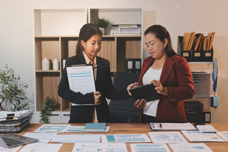 Business meeting time. Business man and business woman working on startup project.の写真素材