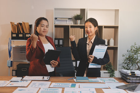 Business meeting time. Business man and business woman working on startup project.の写真素材