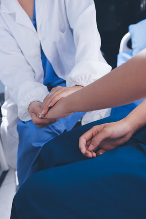 The doctor is checking and encouraging the patient.の写真素材