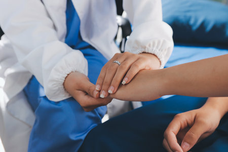 The doctor is checking and encouraging the patient.の写真素材