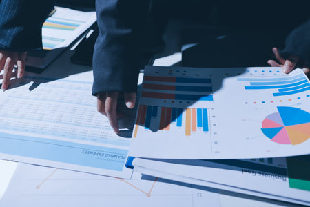 Two business people analyzing the data