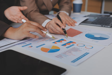 Accounting company provide finance and taxation planning for profitable cash flow, Auditor and accountant team working in office, analyze financial data and accounting record with calculator.Insightの写真素材
