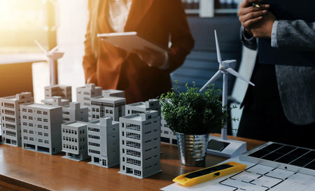 Discussion among businesspeople on the latest developments in solar cell panel technology and Solar...