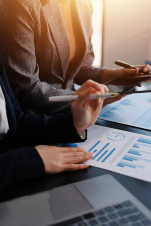 Accounting company provide finance and taxation planning for profitable cash flow, Auditor and accountant team working in office, analyze financial data and accounting record with calculator.Insightの写真素材