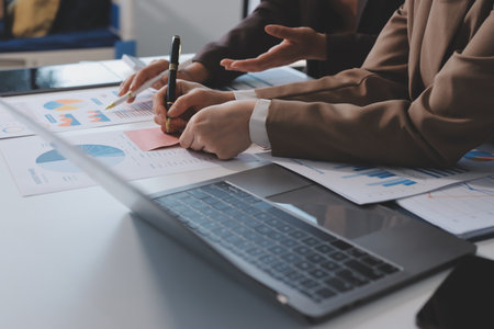 Accounting company provide finance and taxation planning for profitable cash flow, Auditor and accountant team working in office, analyze financial data and accounting record with calculator.Insightの写真素材