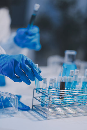 Research, experiment and medical trial being done by a scientist in a lab, science facility or...