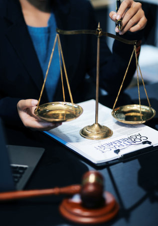 female business woman lawyers working at the law firms. Judge gavel with scales of justice. Legal law, lawyer, documents, advice and justice concept.の写真素材