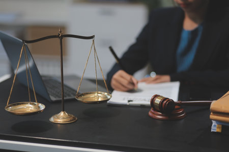 female business woman lawyers working at the law firms. Judge gavel with scales of justice. Legal law, lawyer, documents, advice and justice concept.の写真素材