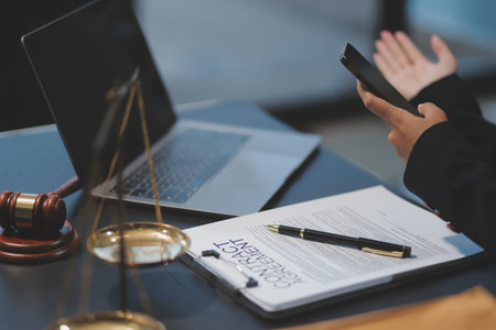 female business woman lawyers working at the law firms. Judge gavel with scales of justice. Legal law, lawyer, documents, advice and justice concept.の写真素材