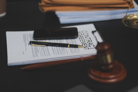female business woman lawyers working at the law firms. Judge gavel with scales of justice. Legal law, lawyer, documents, advice and justice concept.の写真素材