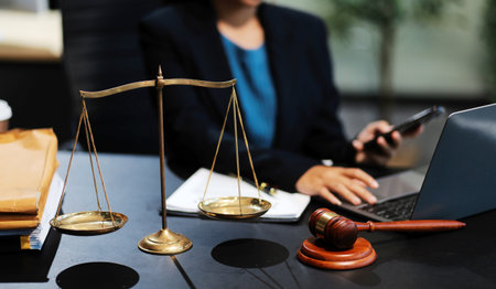 female business woman lawyers working at the law firms. Judge gavel with scales of justice. Legal law, lawyer, documents, advice and justice concept.の写真素材