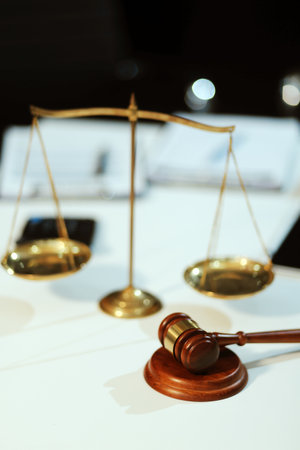 Judge gavel with Justice lawyers having team meeting at law firm background. Concepts of Law and Legal services.の写真素材