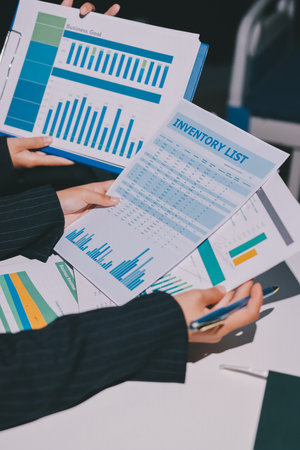 Two business people analyzing the data