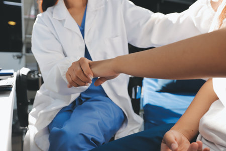 The doctor is checking and encouraging the patient.の写真素材