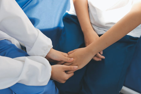 The doctor is checking and encouraging the patient.の写真素材