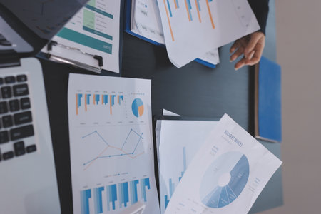 Team of business people working together in the meeting room office,teamwork background charts and...