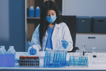 Research, experiment and medical trial being done by a scientist in a lab, science facility or...