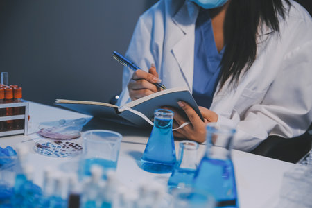 Research, experiment and medical trial being done by a scientist in a lab, science facility or...