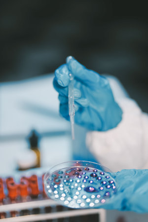 Research, experiment and medical trial being done by a scientist in a lab, science facility or...