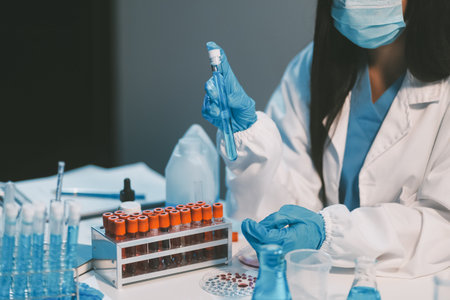 Research, experiment and medical trial being done by a scientist in a lab, science facility or...