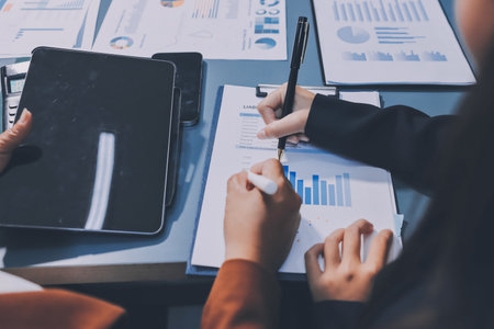 Business Documents, Auditor businesswoman checking searching document legal prepare paperwork or report for analysis TAX time,accountant Documents data contract partner deal in workplace officeの写真素材