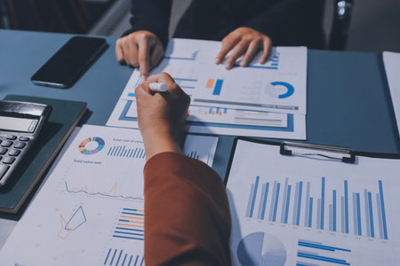 Business Documents, Auditor businesswoman checking searching document legal prepare paperwork or report for analysis TAX time,accountant Documents data contract partner deal in workplace officeの写真素材