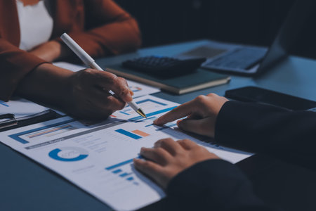 Business Documents, Auditor businesswoman checking searching document legal prepare paperwork or report for analysis TAX time,accountant Documents data contract partner deal in workplace officeの写真素材