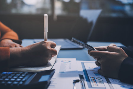 Business Documents, Auditor businesswoman checking searching document legal prepare paperwork or report for analysis TAX time,accountant Documents data contract partner deal in workplace officeの写真素材