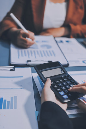 Business Documents, Auditor businesswoman checking searching document legal prepare paperwork or report for analysis TAX time,accountant Documents data contract partner deal in workplace officeの写真素材