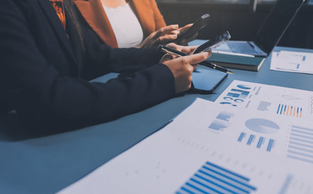 Business Documents, Auditor businesswoman checking searching document legal prepare paperwork or report for analysis TAX time,accountant Documents data contract partner deal in workplace officeの写真素材