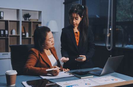Business Documents, Auditor businesswoman checking searching document legal prepare paperwork or report for analysis TAX time,accountant Documents data contract partner deal in workplace officeの写真素材