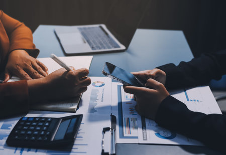 Business Documents, Auditor businesswoman checking searching document legal prepare paperwork or report for analysis TAX time,accountant Documents data contract partner deal in workplace officeの写真素材