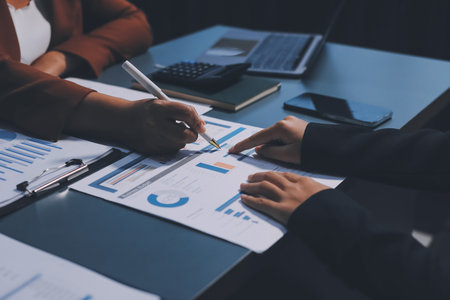 Business Documents, Auditor businesswoman checking searching document legal prepare paperwork or report for analysis TAX time,accountant Documents data contract partner deal in workplace officeの写真素材