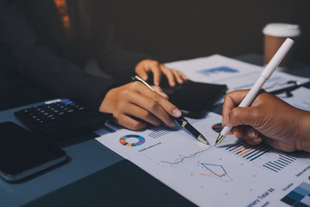 Business Documents, Auditor businesswoman checking searching document legal prepare paperwork or report for analysis TAX time,accountant Documents data contract partner deal in workplace officeの写真素材
