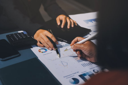 Business Documents, Auditor businesswoman checking searching document legal prepare paperwork or report for analysis TAX time,accountant Documents data contract partner deal in workplace officeの写真素材